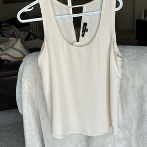 Size small cream blouse, flattering style, double lined